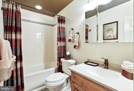 a room with gym equipment and a window