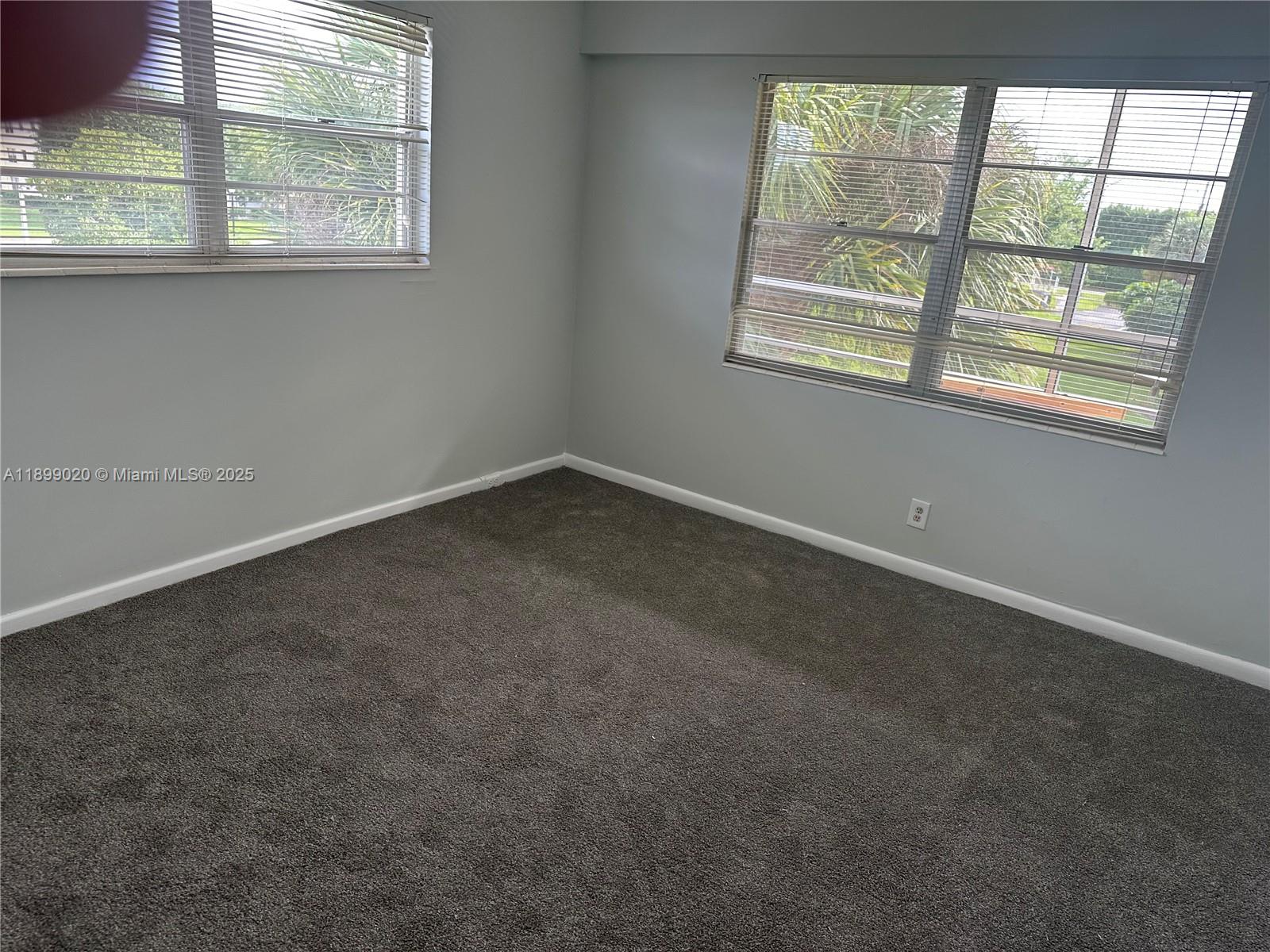 365 Brighton I, Unit 365 Boca Raton, FL 33434 - Photo 10 of 21 an empty room with a window