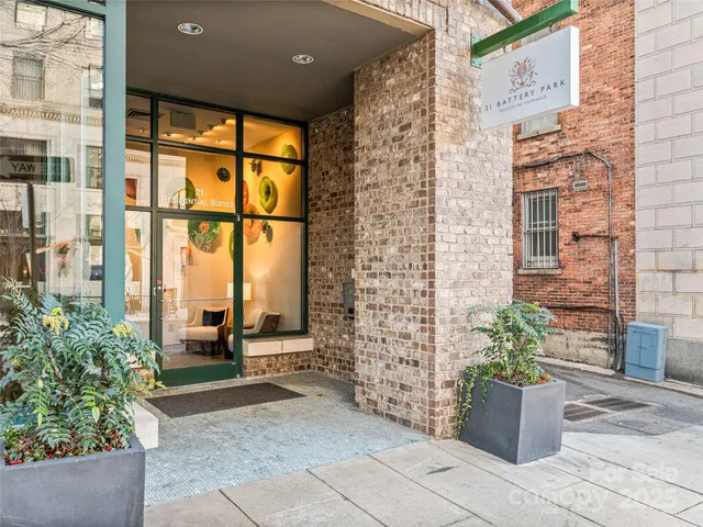 a building outdoor space with potted plants