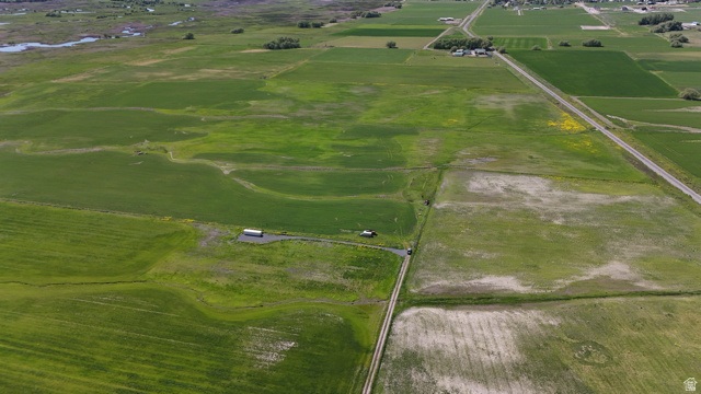 320 South 5400 West Logan, UT 84321 - Photo 6 of 42 Expansive agricultural land featuring multiple cultivated fields and visible dirt paths