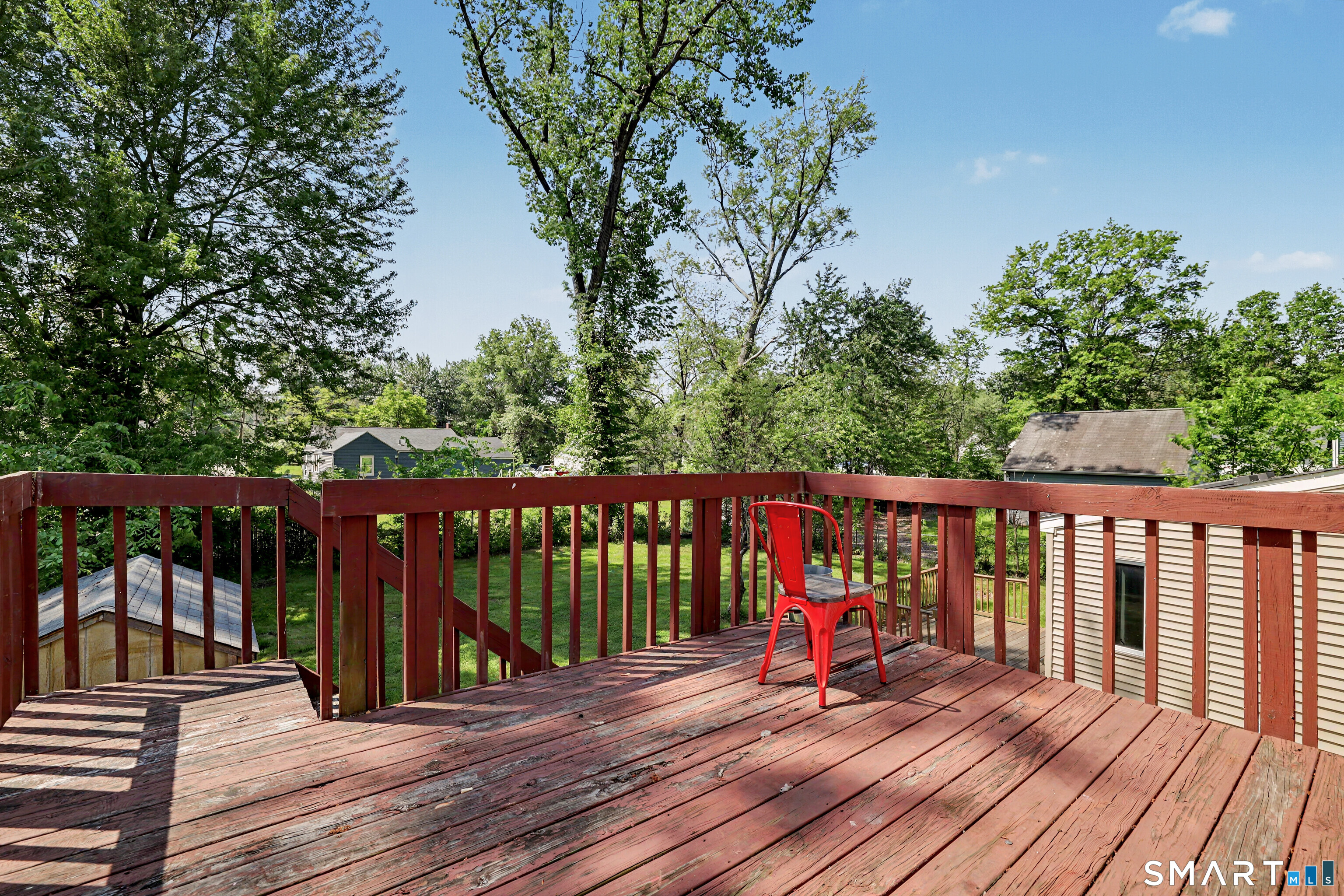 97 Boothbay Street Bloomfield, CT 06002 - Photo 31 of 33 a view of wooden deck and a garden