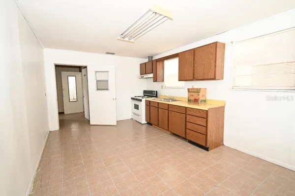 a view of a kitchen with a sink
