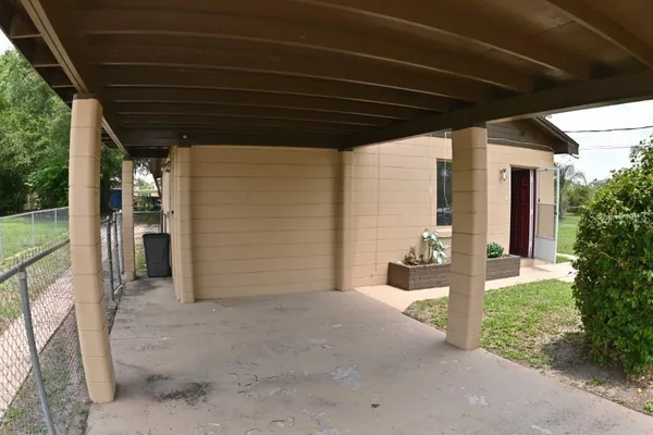 a view of a porch with seating space