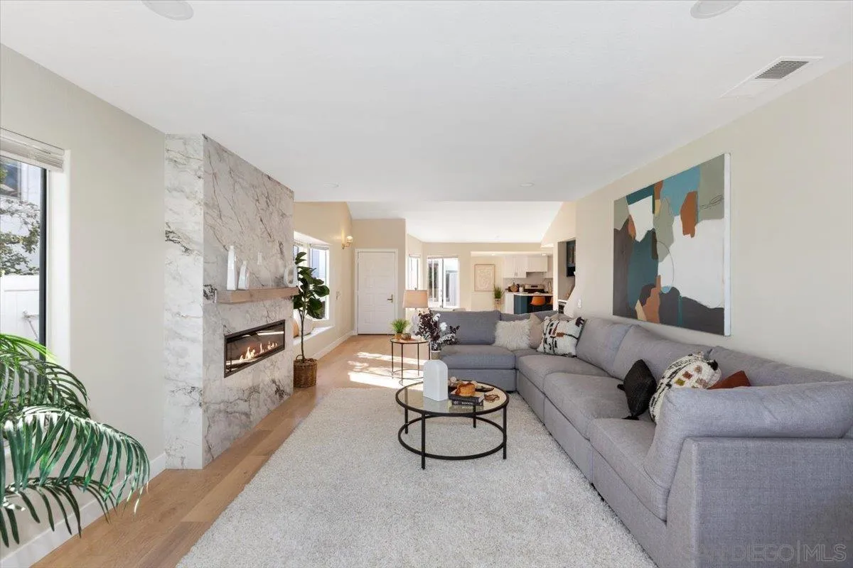 4692 Adra Way Oceanside, CA 92056 - Photo 14 of 51 a living room with furniture white walls and white walls