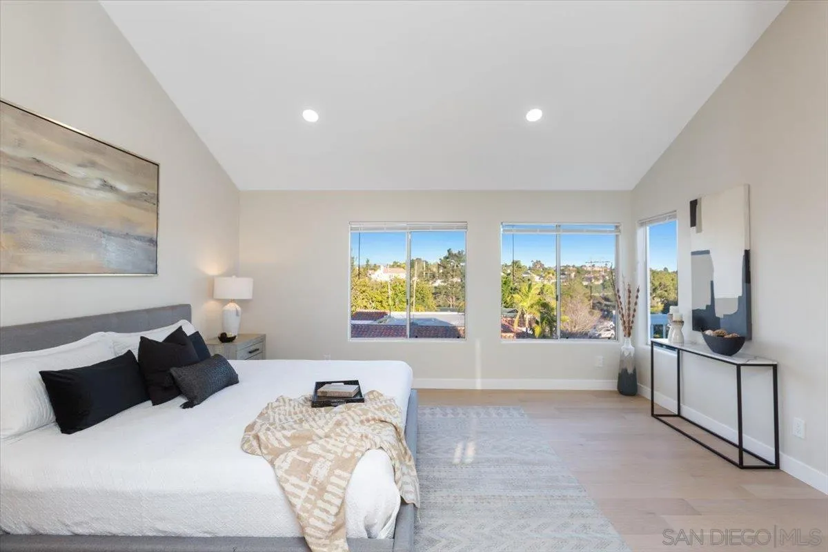 4692 Adra Way Oceanside, CA 92056 - Photo 28 of 51 a bedroom with furniture and a flat screen tv
