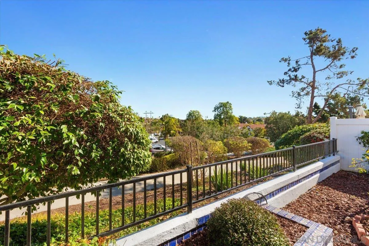 4692 Adra Way Oceanside, CA 92056 - Photo 36 of 51 a view of a balcony with flower plants
