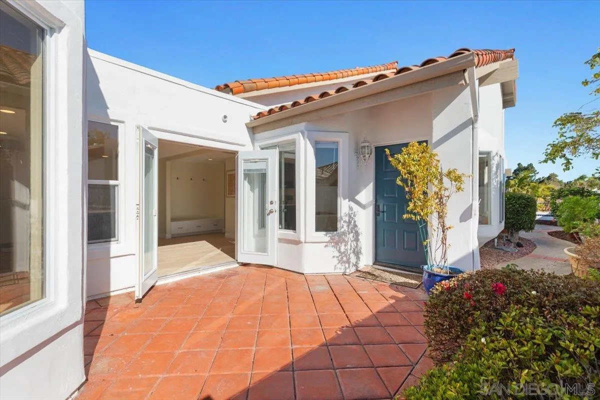 4692 Adra Way Oceanside, CA 92056 - Photo 43 of 51 a front view of a house with garden