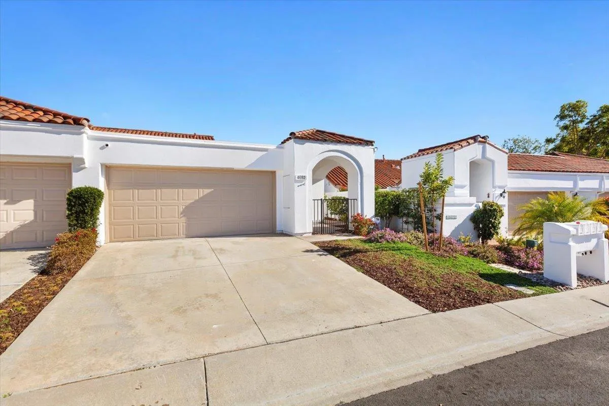 4692 Adra Way Oceanside, CA 92056 - Photo 46 of 51 a front view of a house with garden