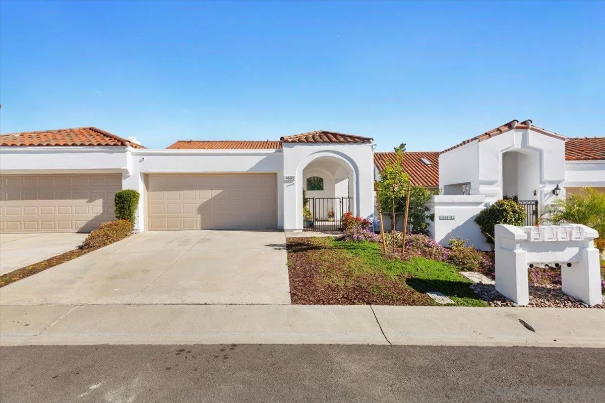 4692 Adra Way Oceanside, CA 92056 - Photo 47 of 51 a front view of a house with garden