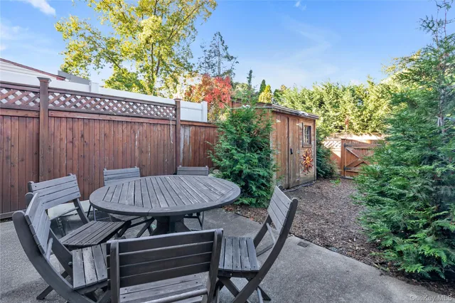 a view of a patio with furniture