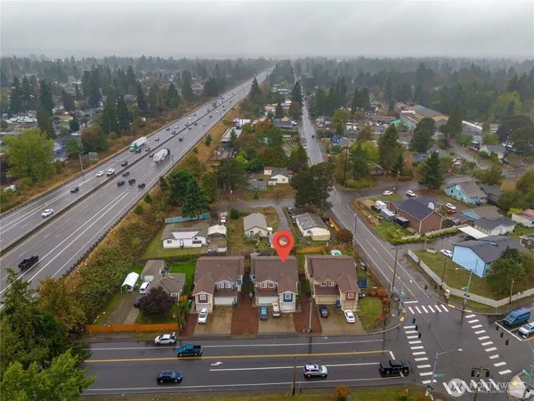 a front view of a house with parking