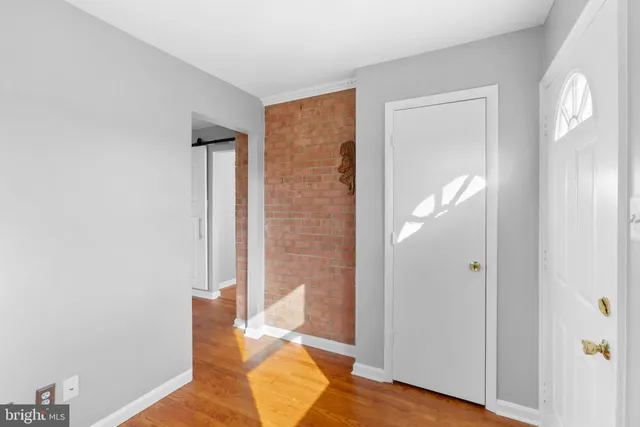 a view of a bathroom with tub and shower