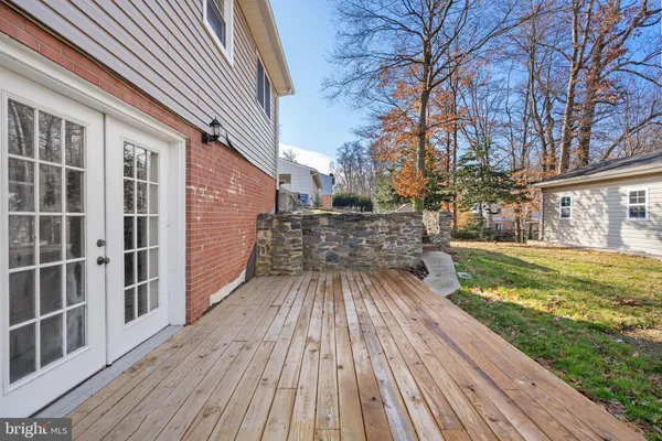 a view of balcony with wooden floor and outdoor space