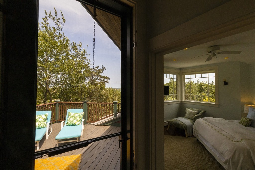 101 Associates Road Falmouth, MA 02540 - Photo 16 of 19 a bedroom with furniture and a large window