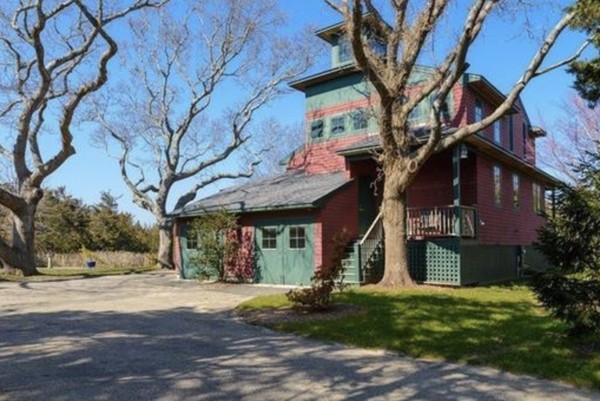 101 Associates Road Falmouth, MA 02540 - Photo 2 of 19 a view of a white house with a large tree