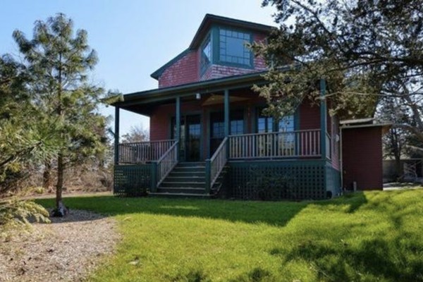 101 Associates Road Falmouth, MA 02540 - Photo 3 of 19 a front view of a house with a yard