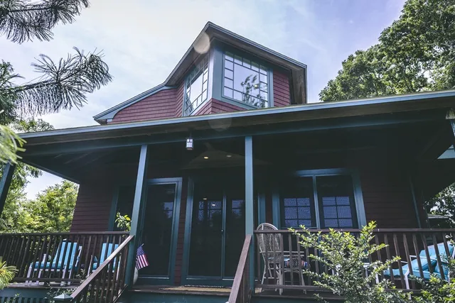 a view of a house with a porch