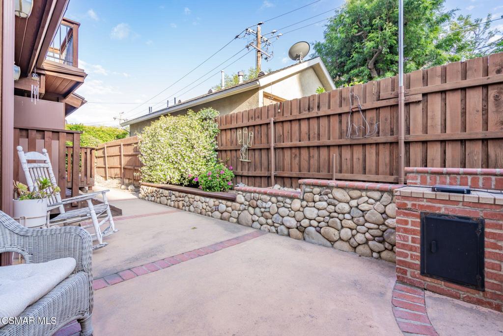 6078 Peppertree Lane Simi Valley, CA 93063 - Photo 50 of 59 a view of a chair and table in the patio