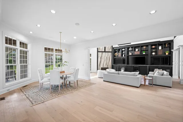 a bathroom with a sink a mirror and vanity