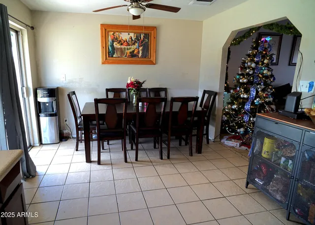 a view of a dining room with furniture