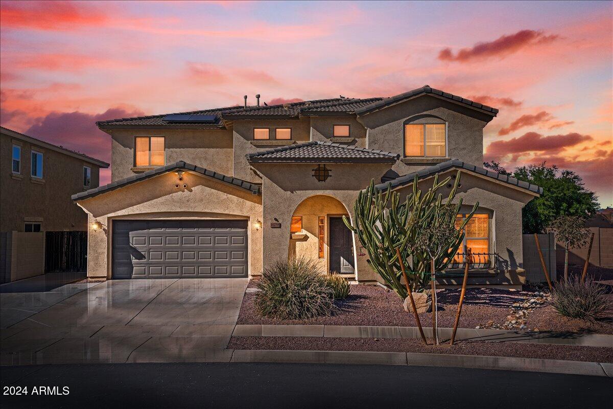 16758 West Rowel Road Surprise, AZ 85387 - Photo 1 of 59 01-Front of home twilight