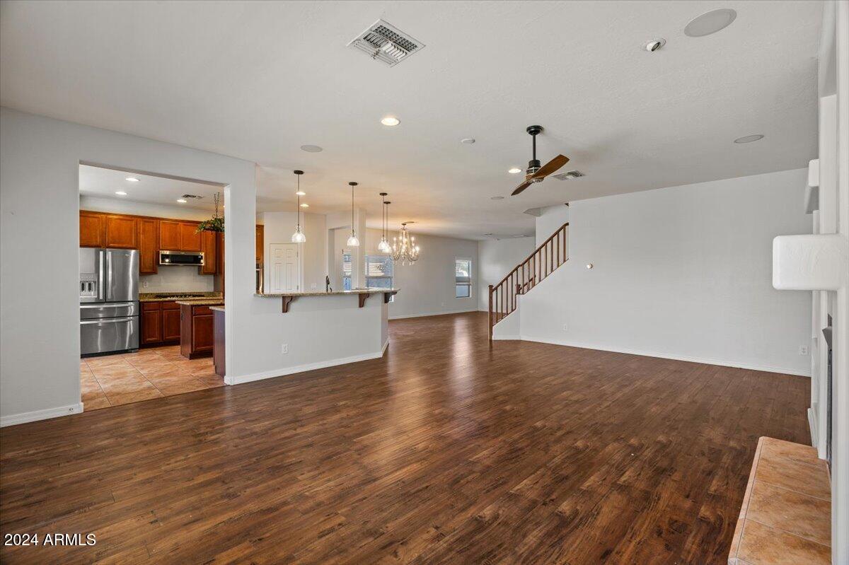 16758 West Rowel Road Surprise, AZ 85387 - Photo 15 of 59 15-Family Room & Kitchen