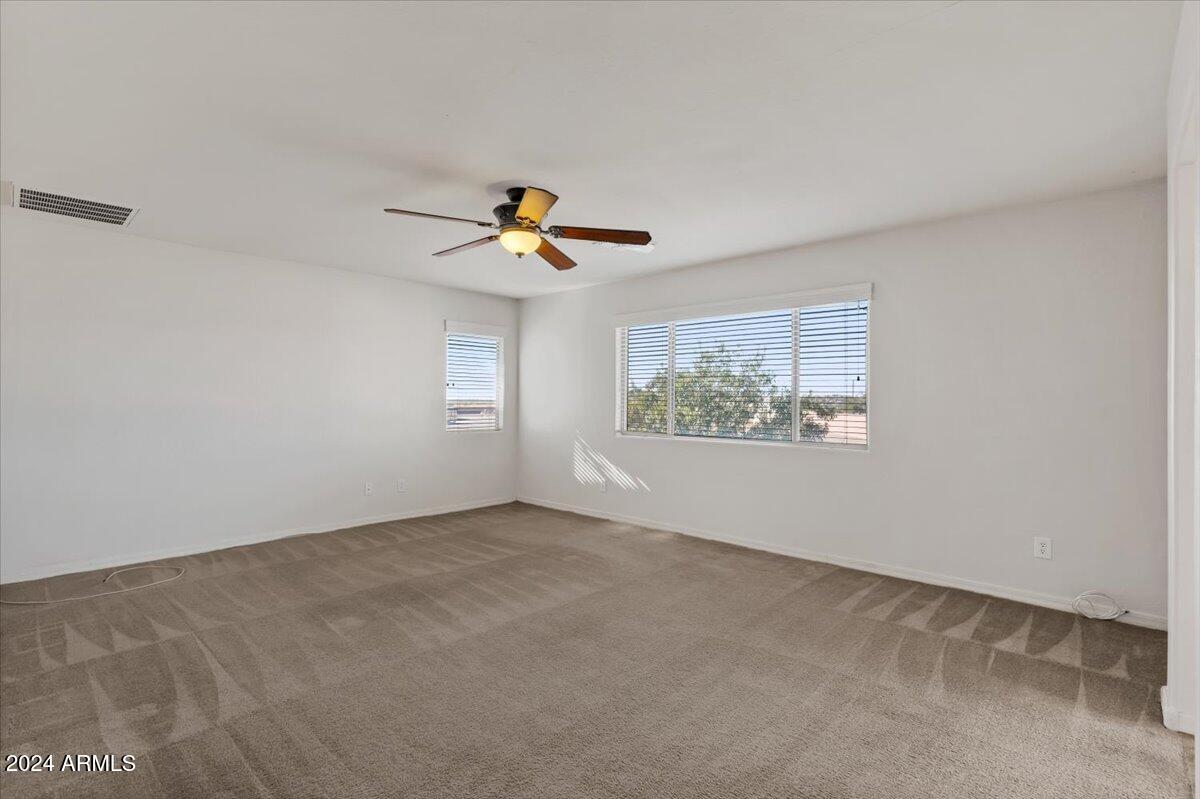 16758 West Rowel Road Surprise, AZ 85387 - Photo 29 of 59 30-Primary bedroom