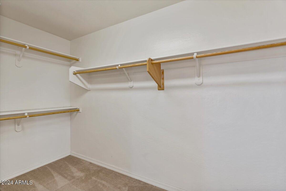 16758 West Rowel Road Surprise, AZ 85387 - Photo 34 of 59 35-Primary closet