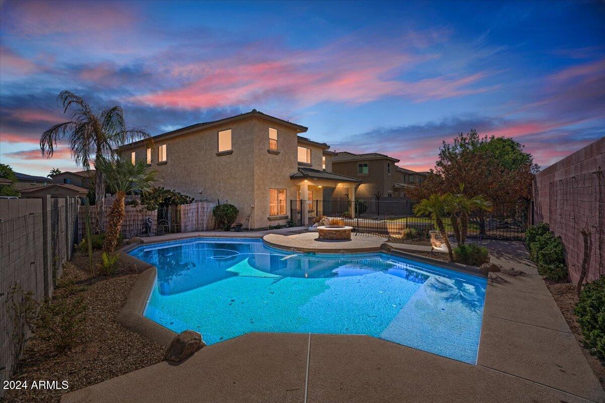 16758 West Rowel Road Surprise, AZ 85387 - Photo 58 of 59 59-Back of home twilight
