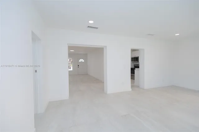a bathroom with a toilet a sink and shower