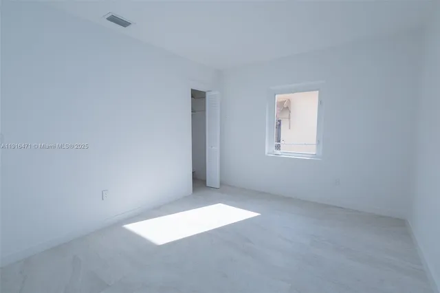 an empty room with a window