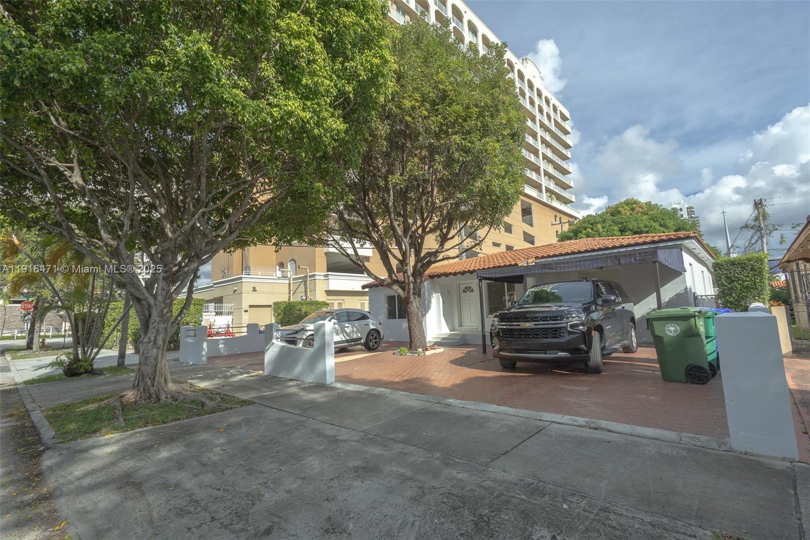 2675 Southwest 24th Terrace Miami, FL 33145 - Photo 4 of 36 a view of a car parked in front of house