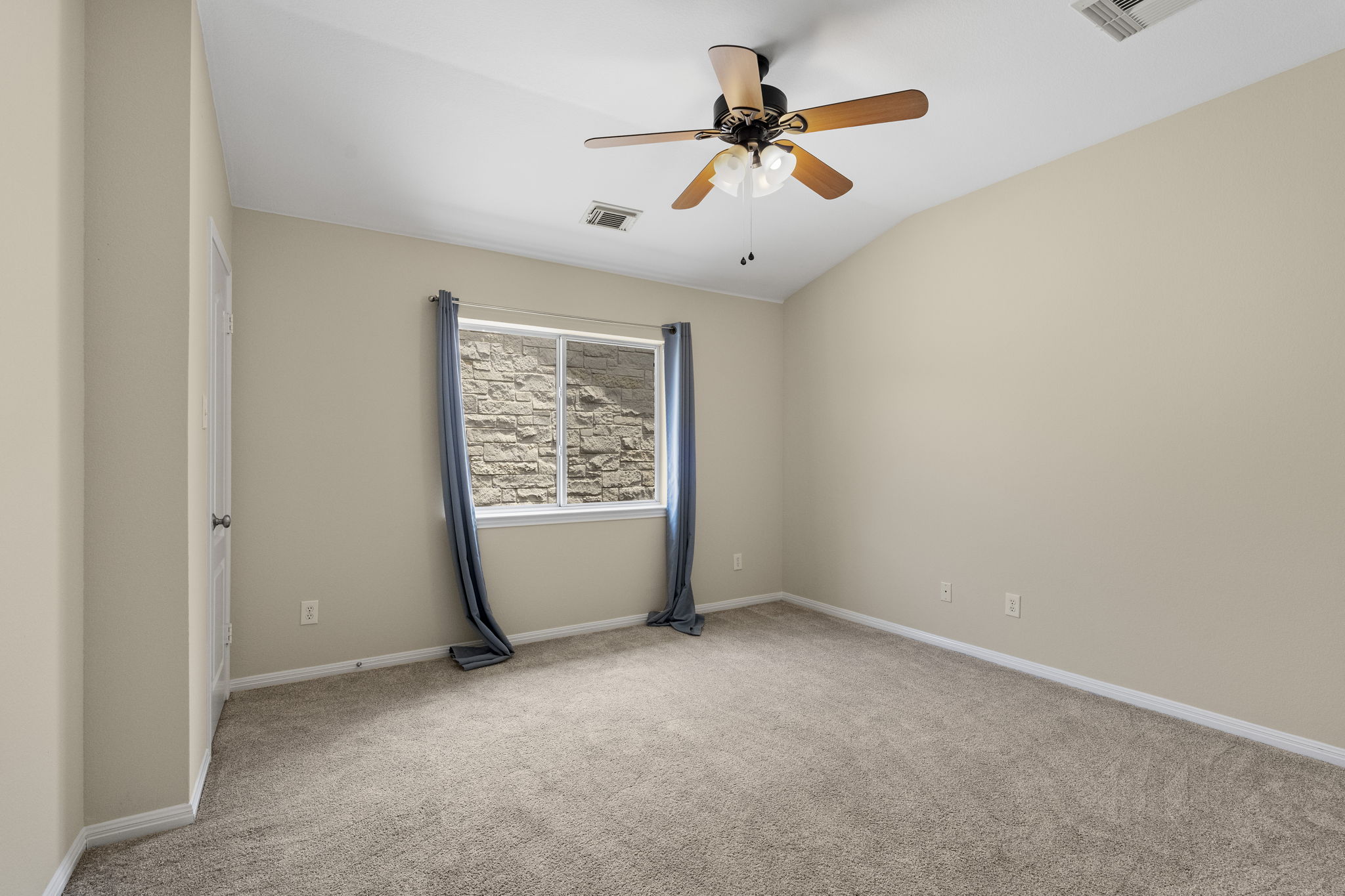 1822 Nelson Ranch Loop Cedar Park, TX 78613 - Photo 31 of 40 Fresh carpet provides a comfortable finish throughout the secondary sleeping spaces.