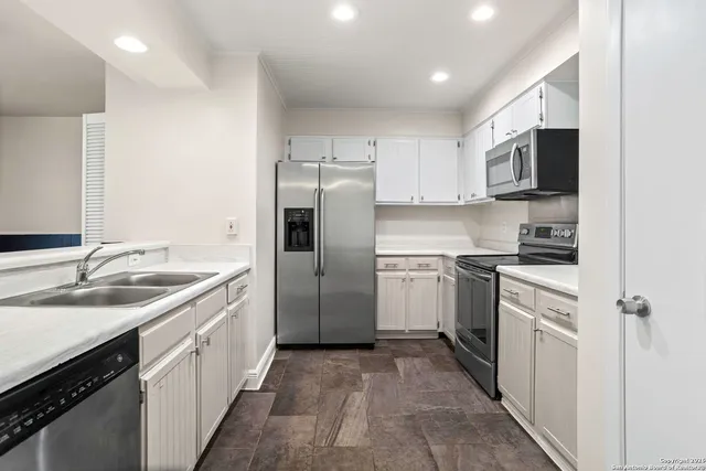 a view of a swimming pool with an outdoor space and seating area