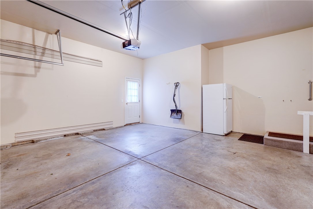 15 Jenna Way Henrietta, NY 14623 - Photo 28 of 33 2 car attached garage (extra refrigerator included