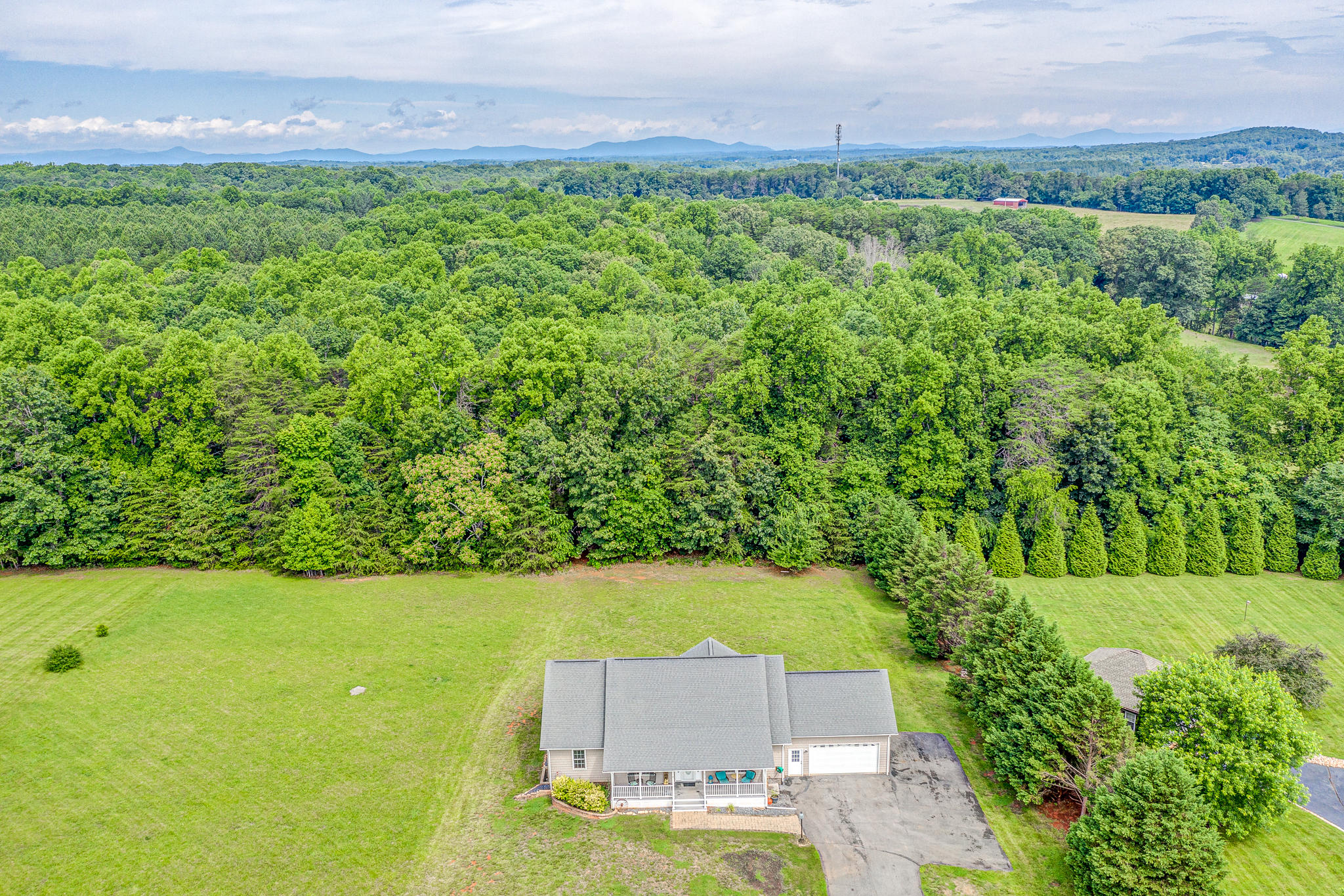 719 Mallard Point Road Wirtz, VA 24184 - Photo 50 of 57 a view of a yard with a outdoor space