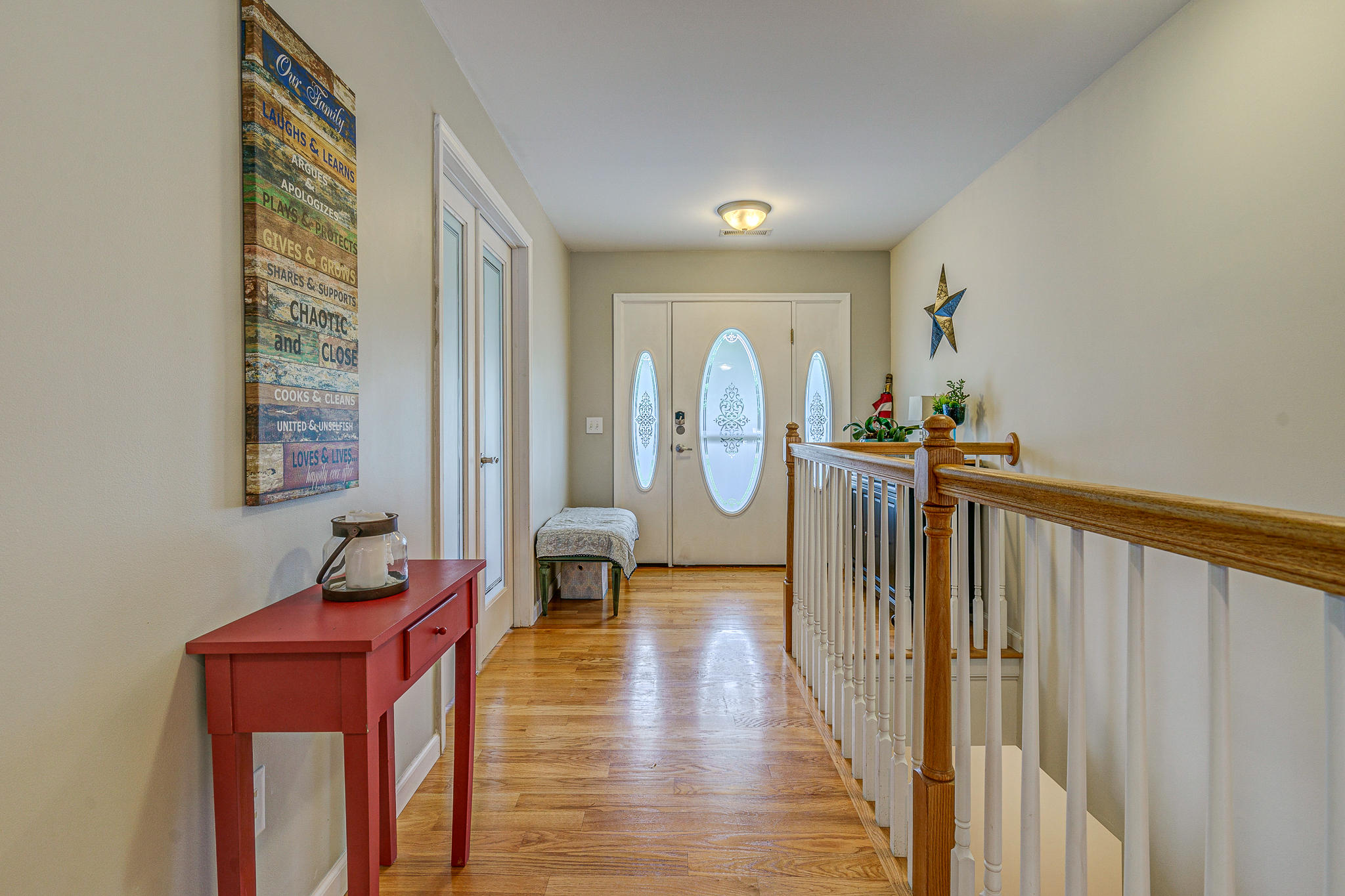 719 Mallard Point Road Wirtz, VA 24184 - Photo 8 of 57 a view of a hallway with wooden floor and windows