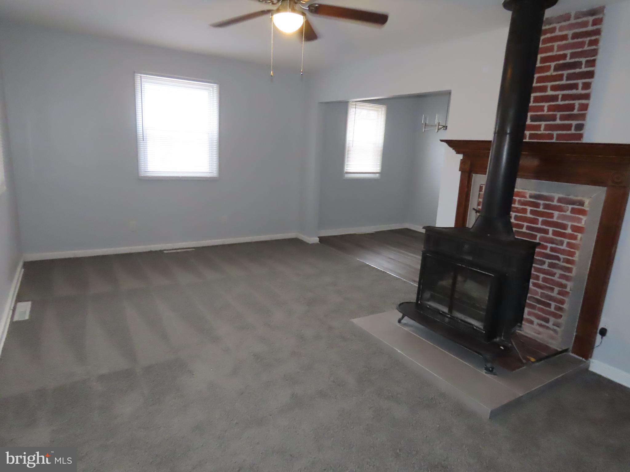 110 Robinson Drive New Castle, DE 19720 - Photo 2 of 10 an empty room with windows