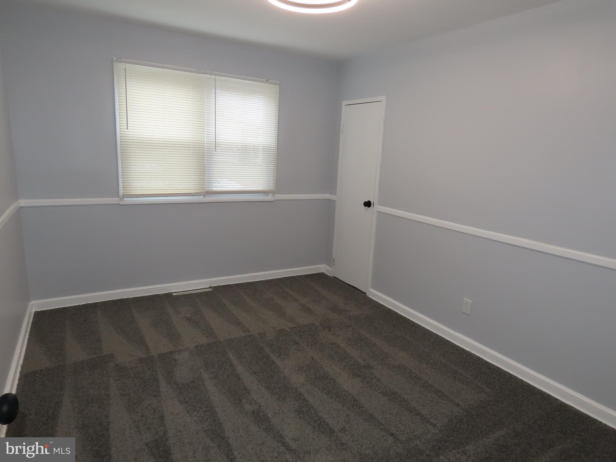 110 Robinson Drive New Castle, DE 19720 - Photo 7 of 10 an empty room with a window