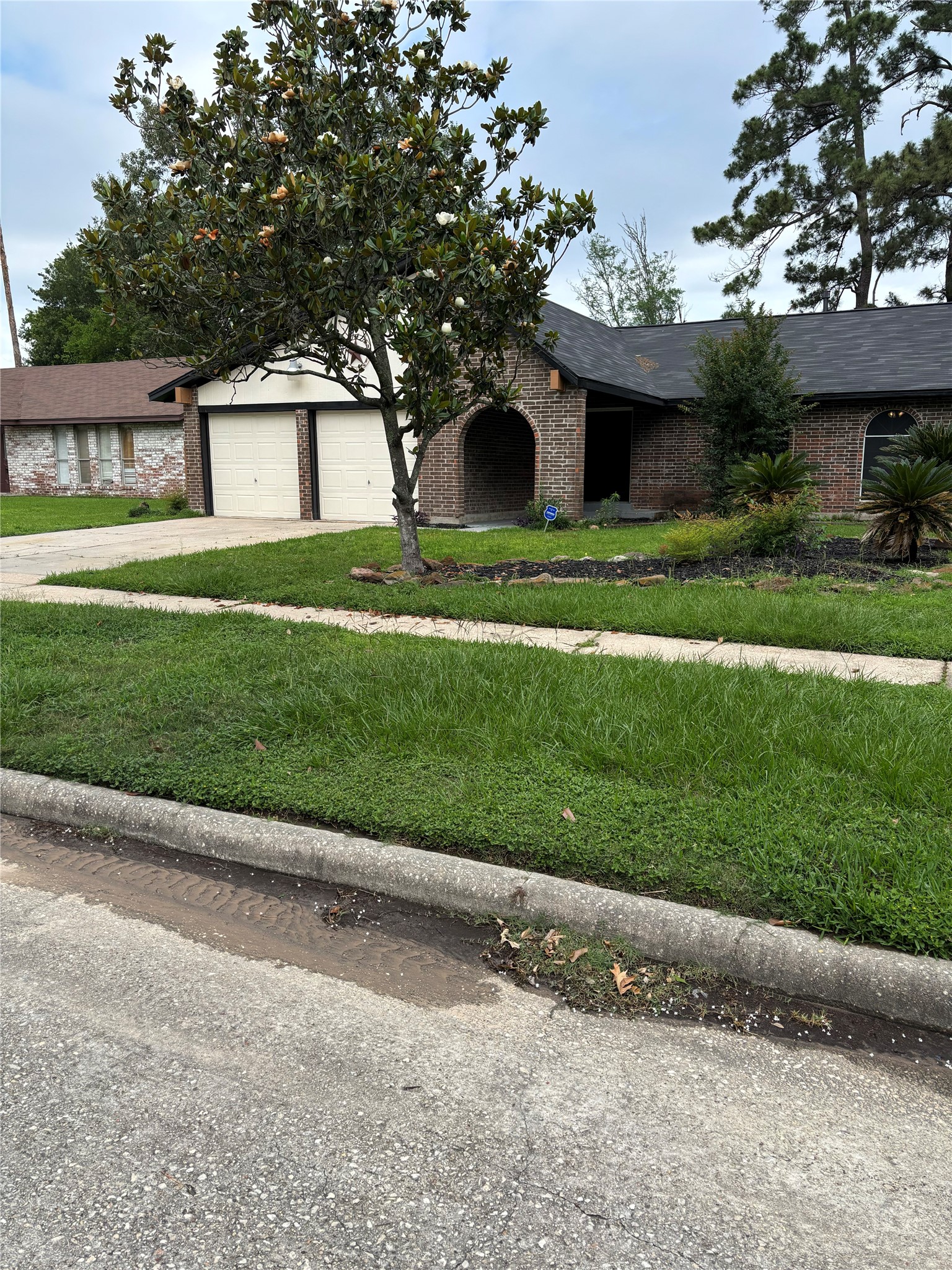 23726 Farm Hill Drive Spring, TX 77373 - Photo 2 of 11 a front view of a house with a yard