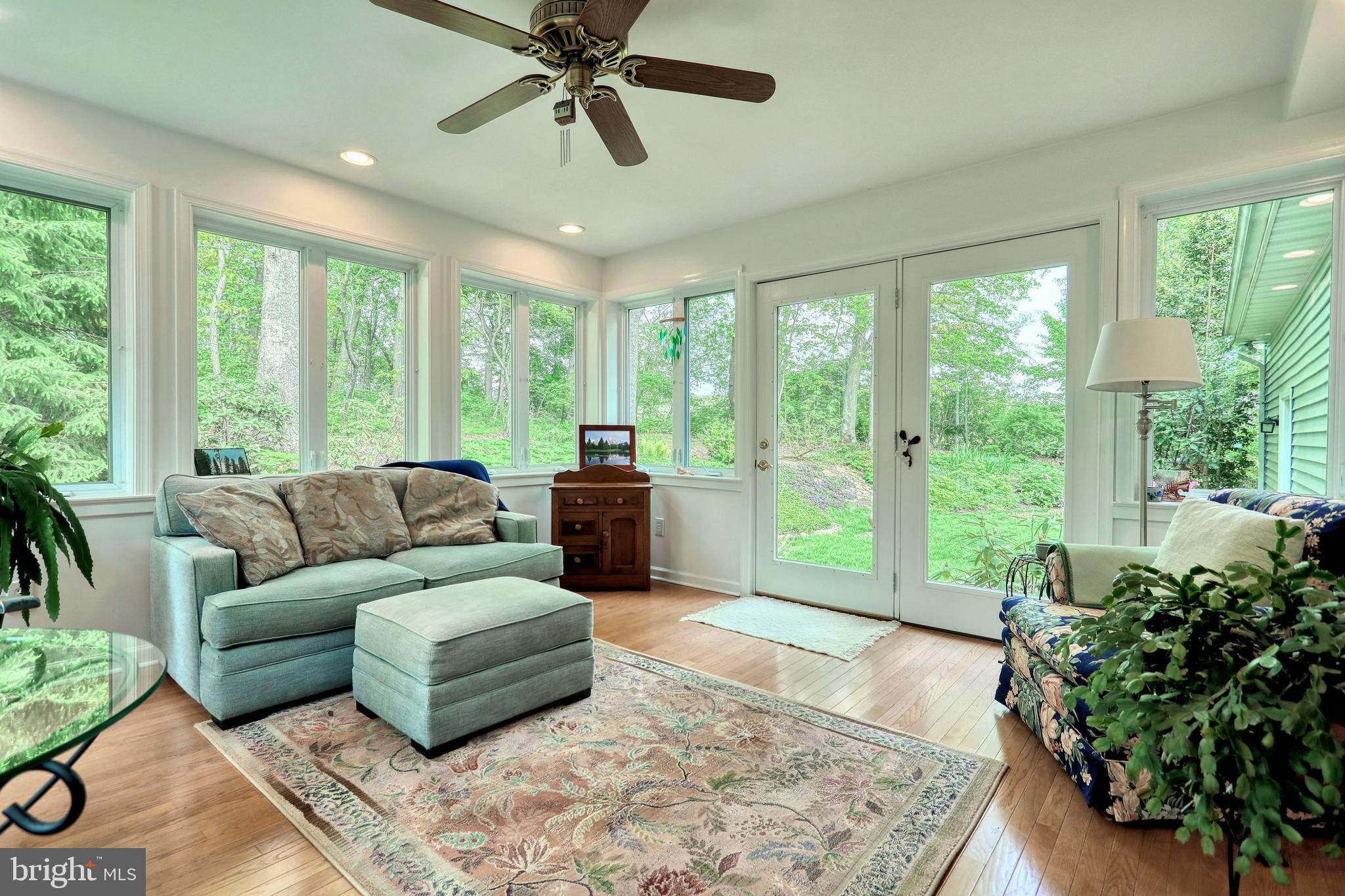 3045 Steltz Road New Freedom, PA 17349 - Photo 13 of 55 Four season room provides a wooded oasis!