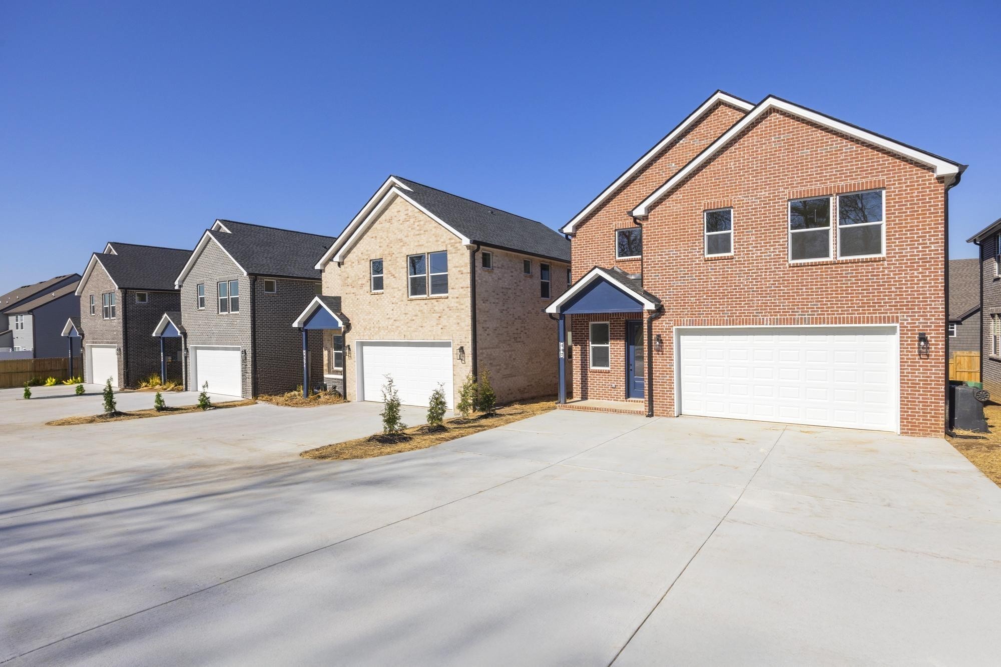 447 Sand Hill Road, Unit 4 La Vergne, TN 37086 - Photo 4 of 27 a front view of a house with a yard