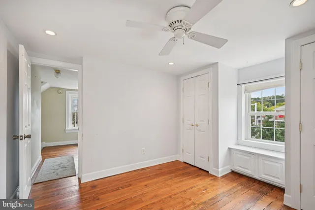 a view of a bathroom with a glass door and a shower