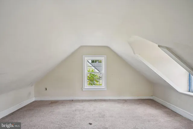 a view of a room that has a window