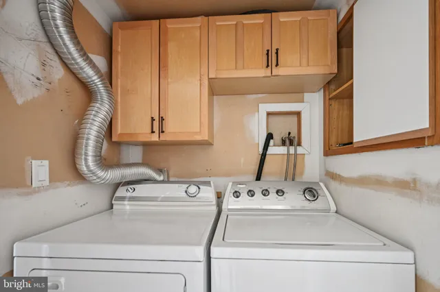 a view of a room with wooden walls