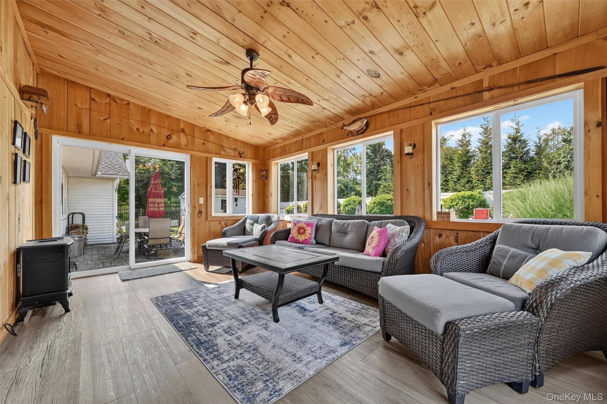 5 Hedges Road Warwick, NY 10990 - Photo 20 of 48 The three-season sunroom is sure to become a favorite spot, surrounded by windows and overlooking the backyard oasis.