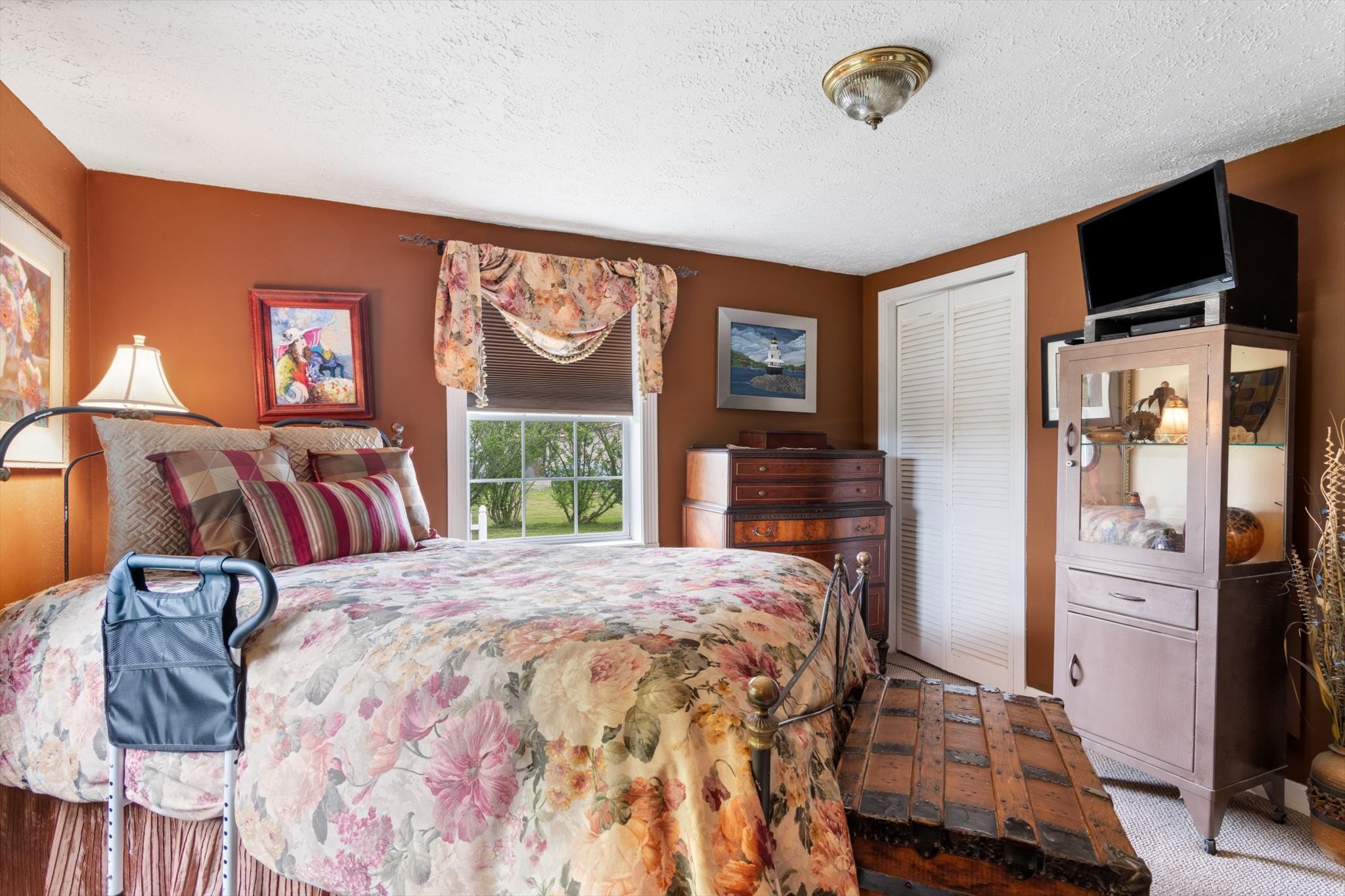 126 Blackey Bandy Road Bethpage, TN 37022 - Photo 15 of 37 a bed room with a bed and a television