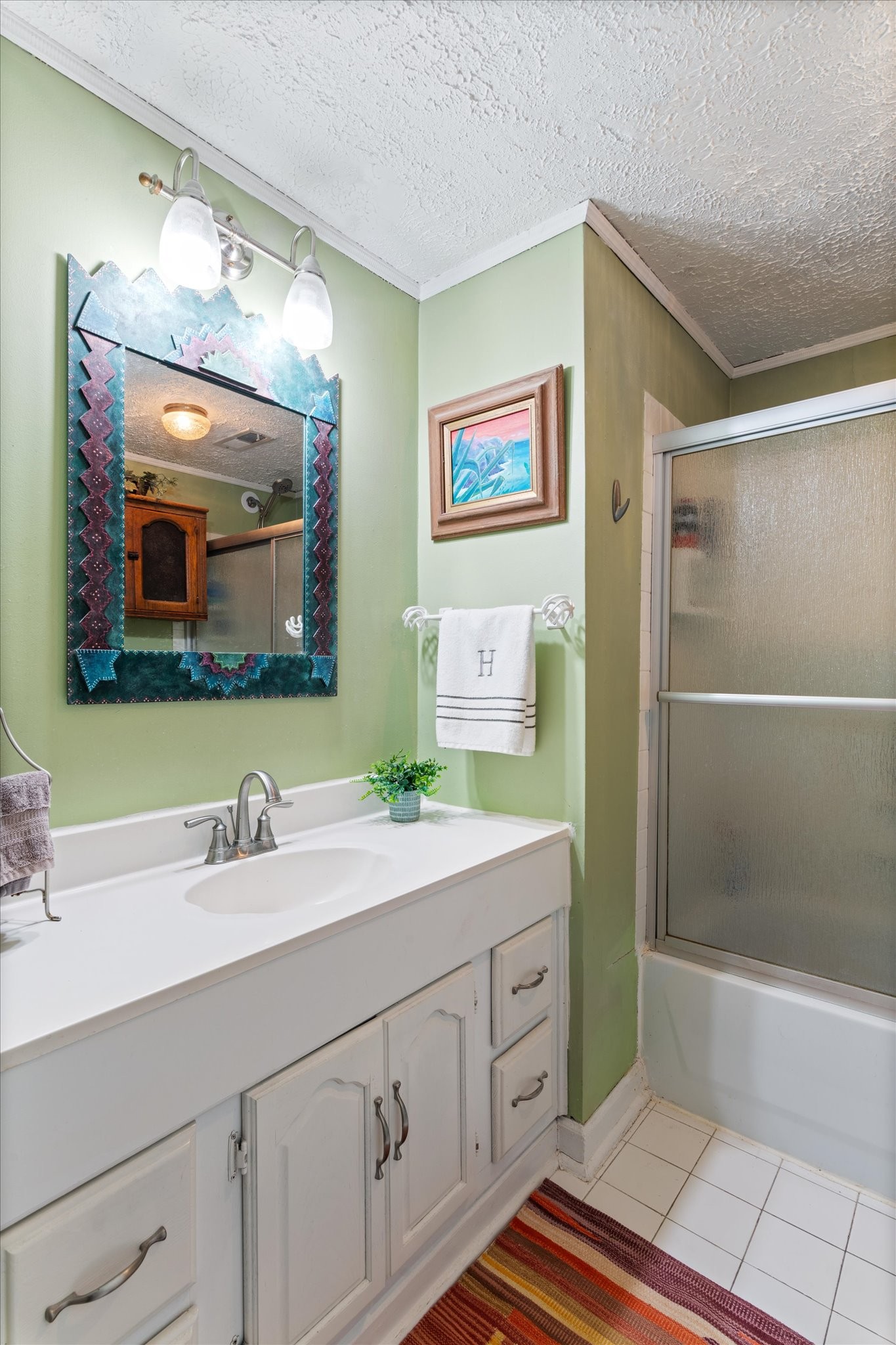 126 Blackey Bandy Road Bethpage, TN 37022 - Photo 16 of 37 a bathroom with a double vanity sink mirror and bathtub