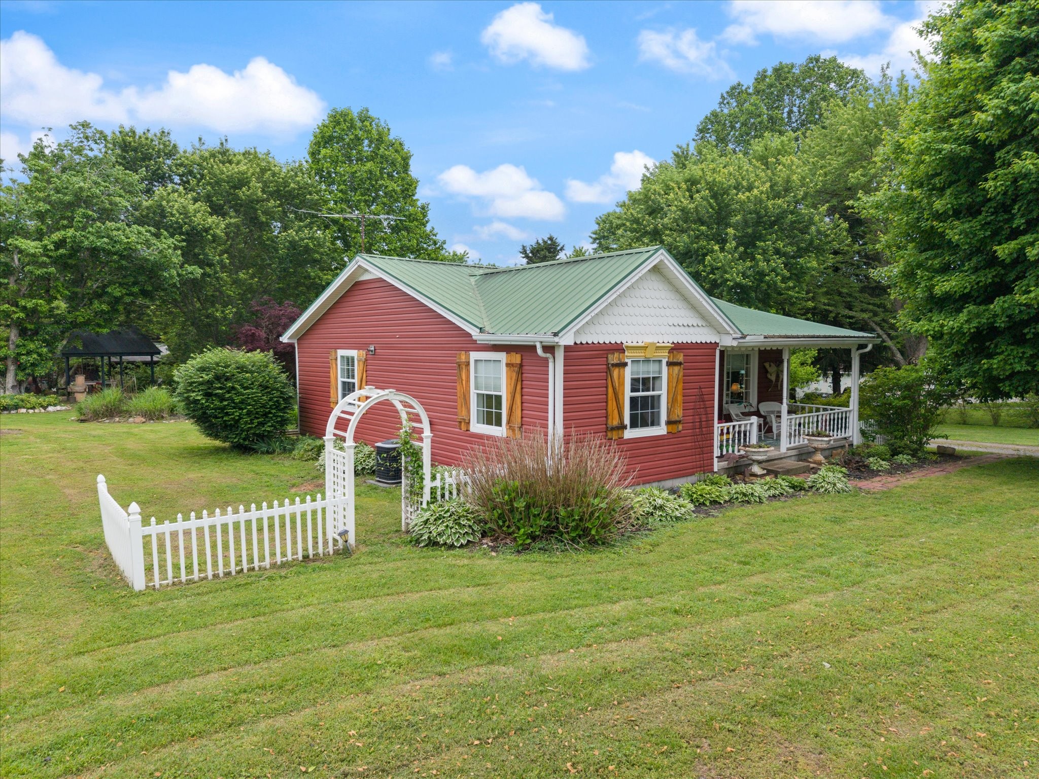 126 Blackey Bandy Road Bethpage, TN 37022 - Photo 18 of 37 a front view of a house with a yard