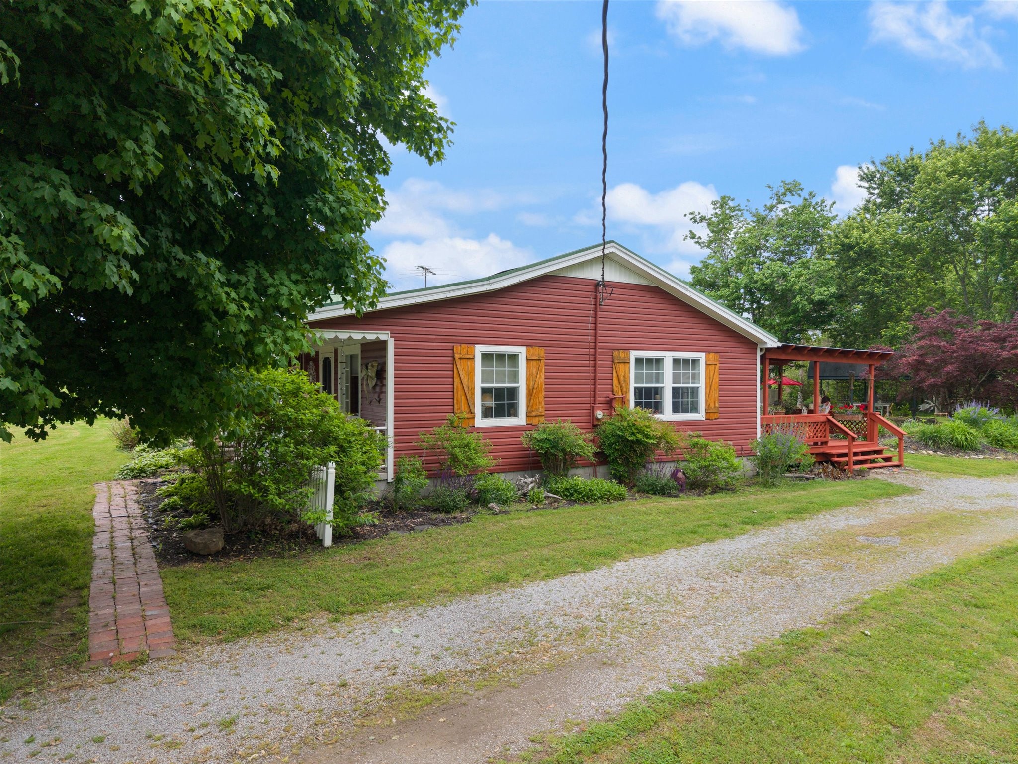 126 Blackey Bandy Road Bethpage, TN 37022 - Photo 19 of 37 a view of a house with a yard